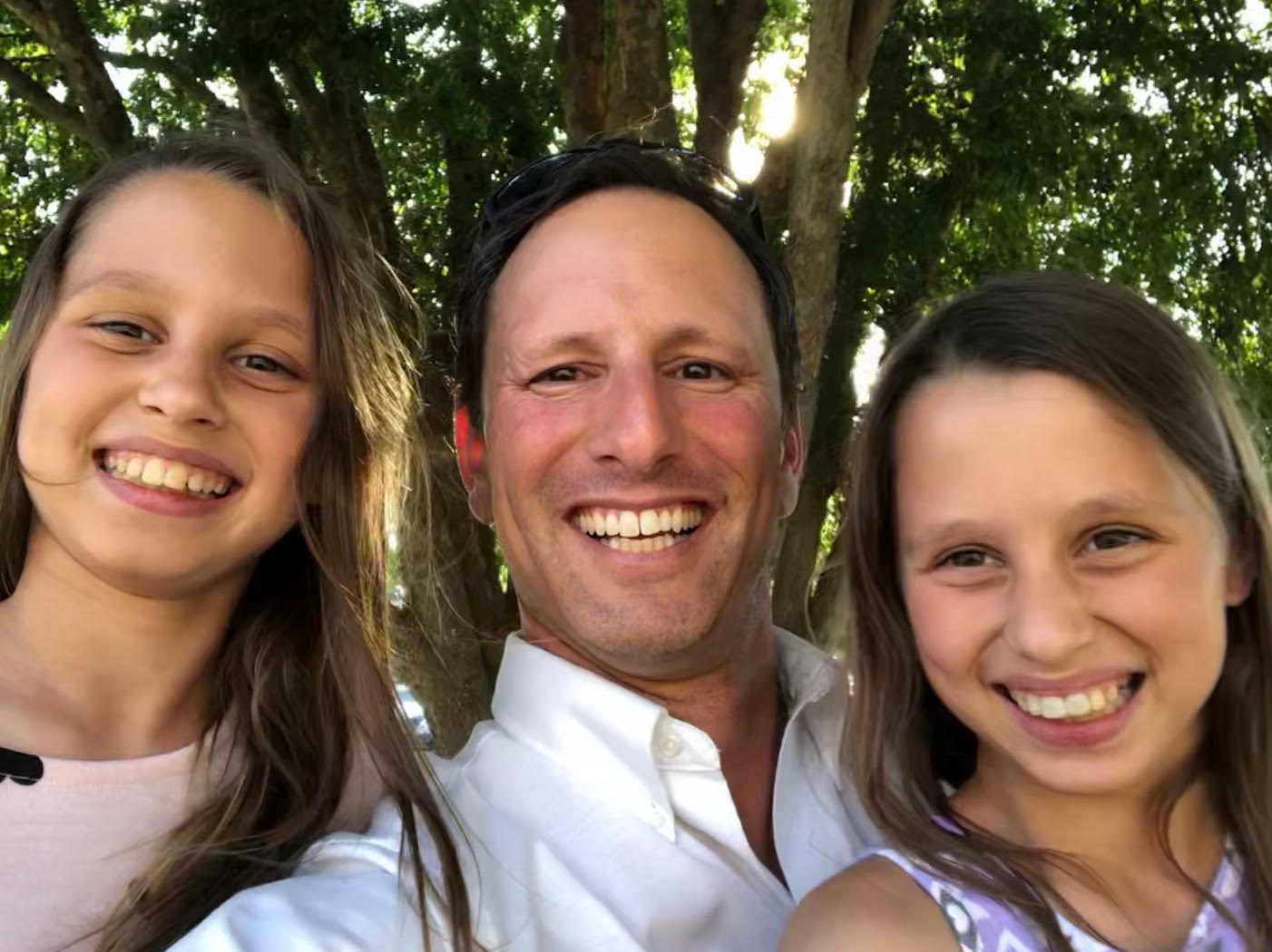 Coach Traub with two of his children